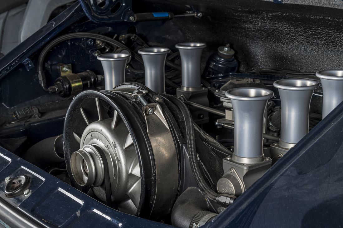 Rennen ITB system with velocity stacks installed around the cooling fan in an air-cooled Porsche 911 engine bay