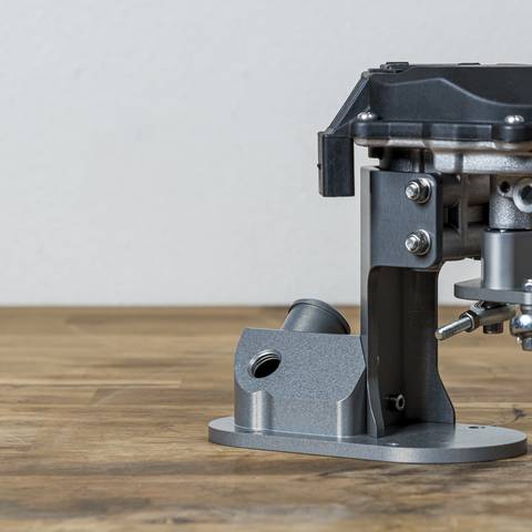 Rennen ITB billet throttle actuator and mounting bracket on a roller-barrel throttle body