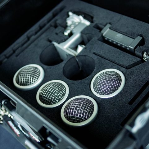 Rennen ITB throttle bodies with mesh-screened velocity stacks and linkage in a custom-cut foam case