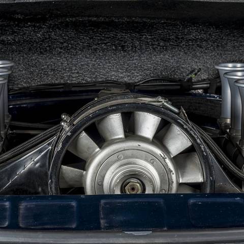 Rennen ITB installation in a dark blue air-cooled Porsche 911