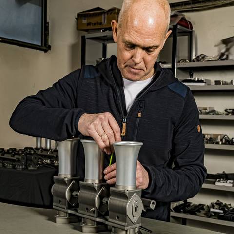 Hand-assembling a Rennen ITB bank at the JSR Engineering workshop bench in Denmark